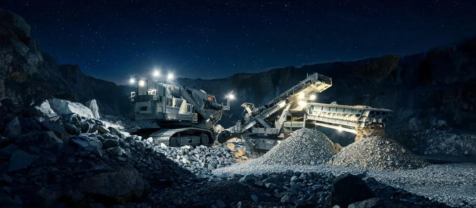 Electric-assist mobile crushing plant at night quarry